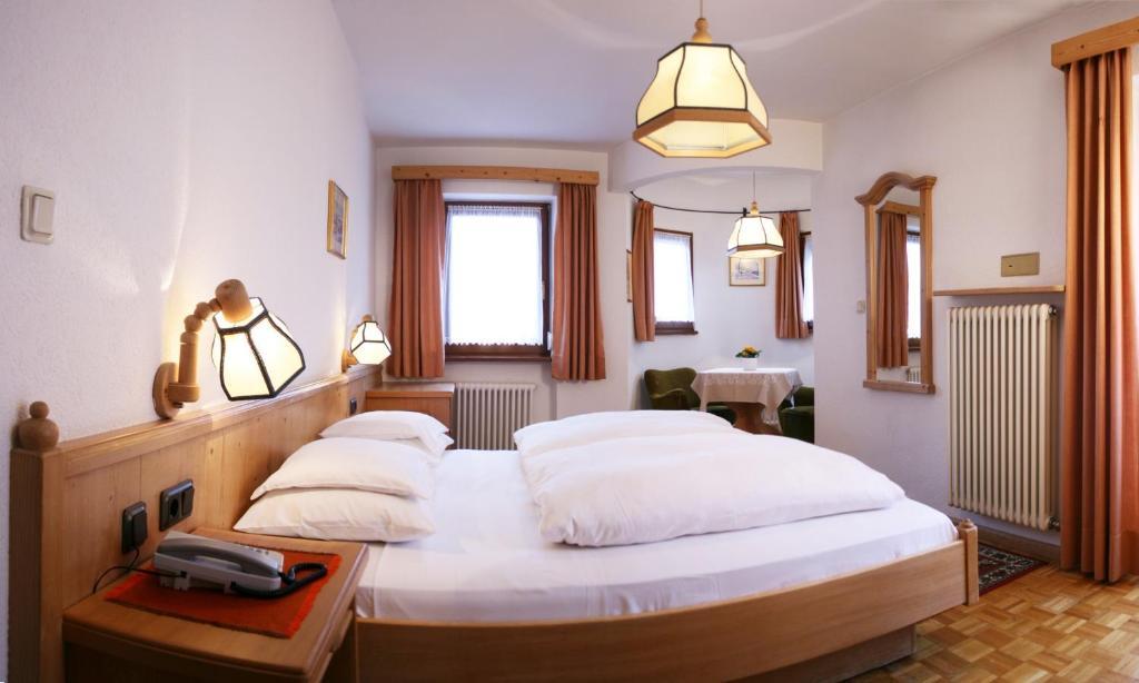 Hotel Dolomiti Madonna Ortisei Szoba fotó