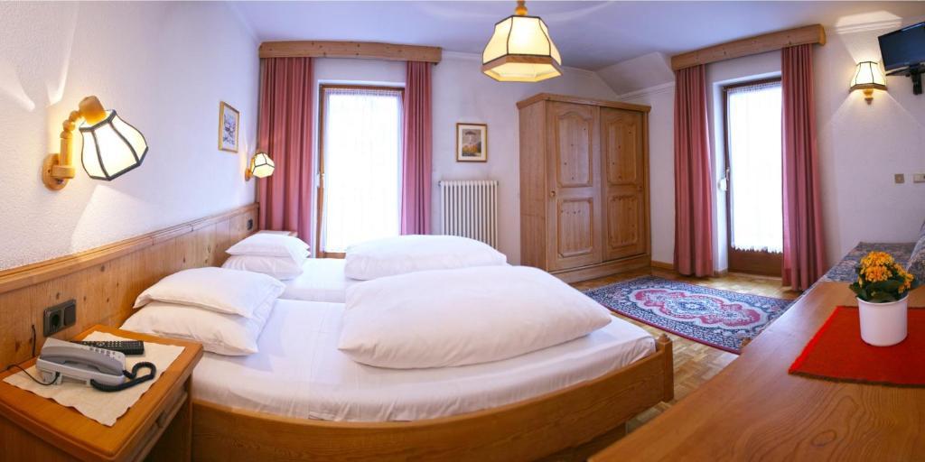 Hotel Dolomiti Madonna Ortisei Szoba fotó